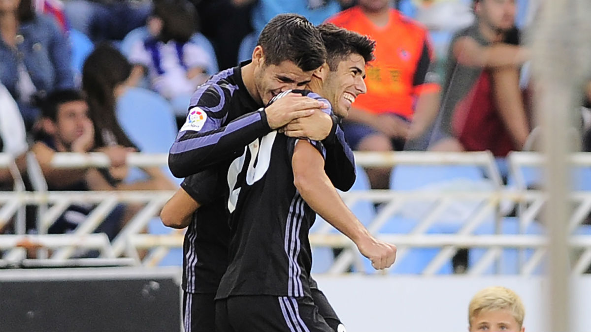 Asensio y Morata celebran un gol. (AFP)