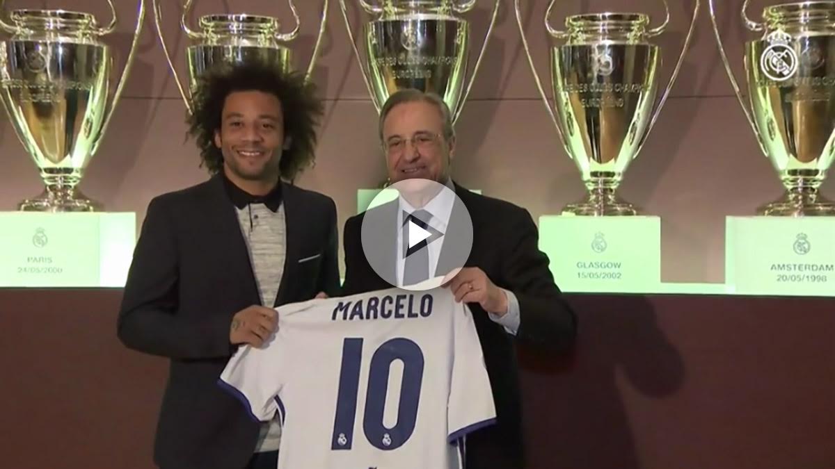 Marcelo y Florentino posan con la camiseta. (realmadrid.com)