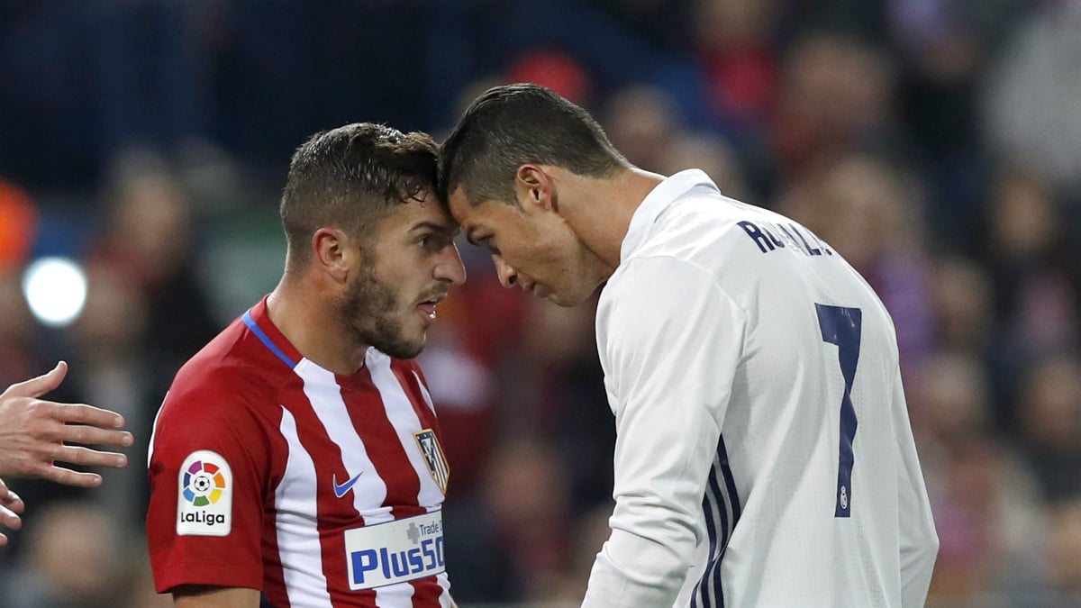 Koke y Cristiano Ronaldo se encaran en un lance del partido. (EFE)