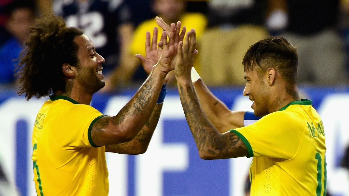 Neymar y Marcelo durante un partido con Brasil. (Getty)