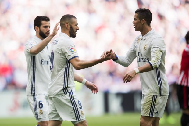 Cristiano y Benzema celebran un tanto del Madrid. (Getty)