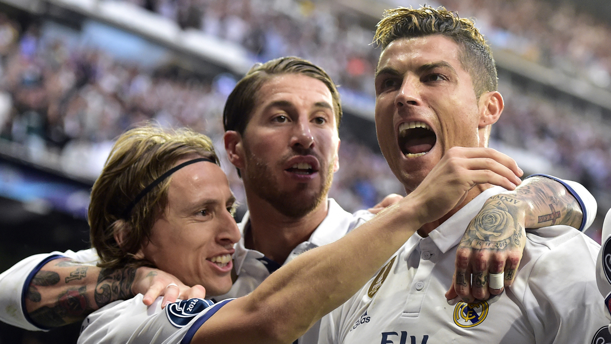 Cristiano, Ramos y Modric celebran el gol del portugués (AFP).