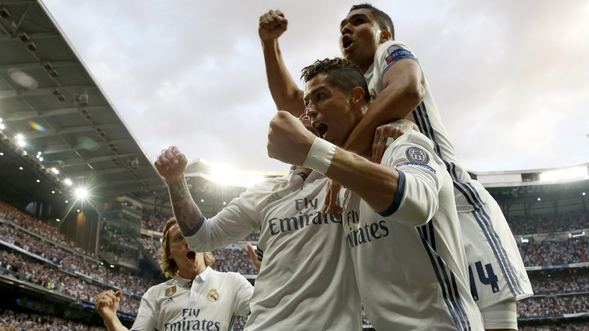 Cristiano Ronaldo celebra uno de los tres goles al Atlético. (EFE)
