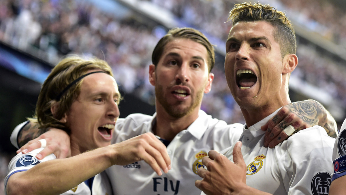 Ronaldo, Ramos y Modric celebran un gol ante el Atlético. (Getty)