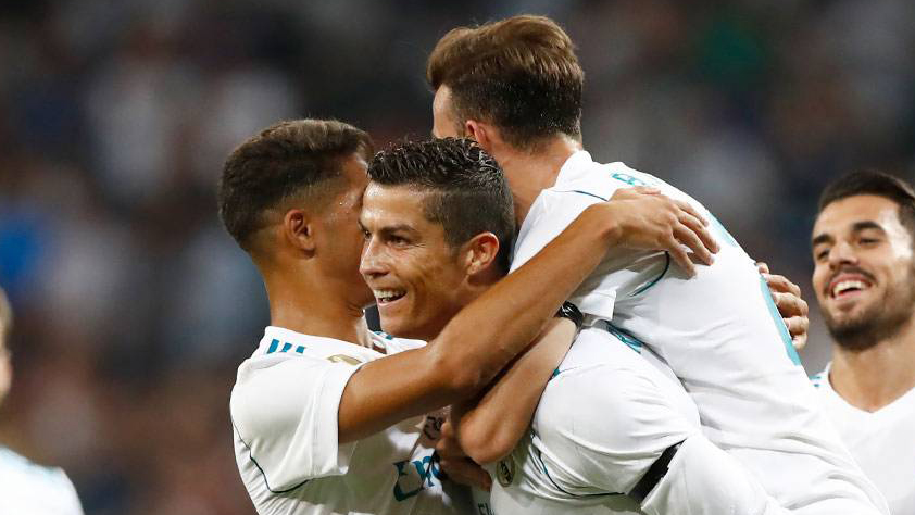 Cristiano celebra su golazo junto a Achraf y Mayoral.