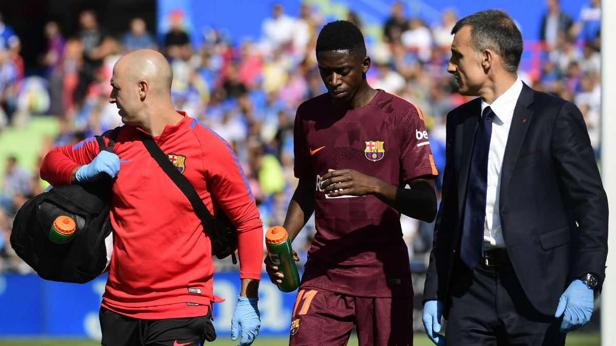 Dembélé se retira lesionado. (AFP)