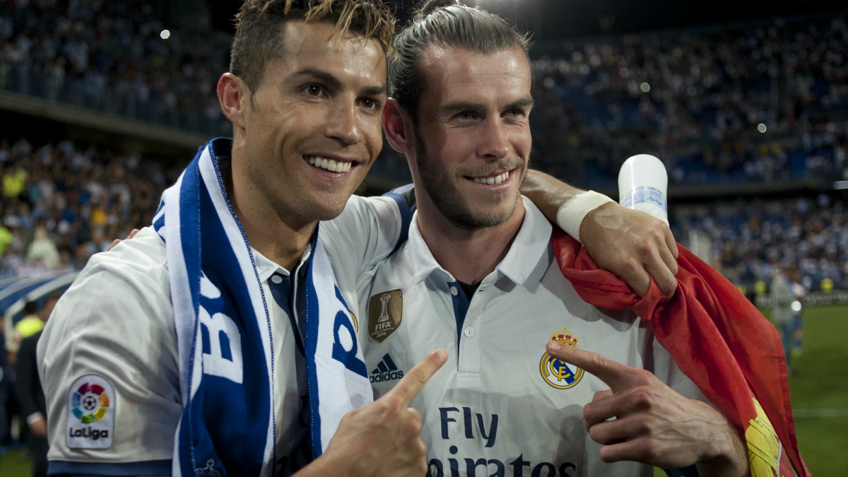 Cristiano y Bale celebran la Duodécima. (AFP)