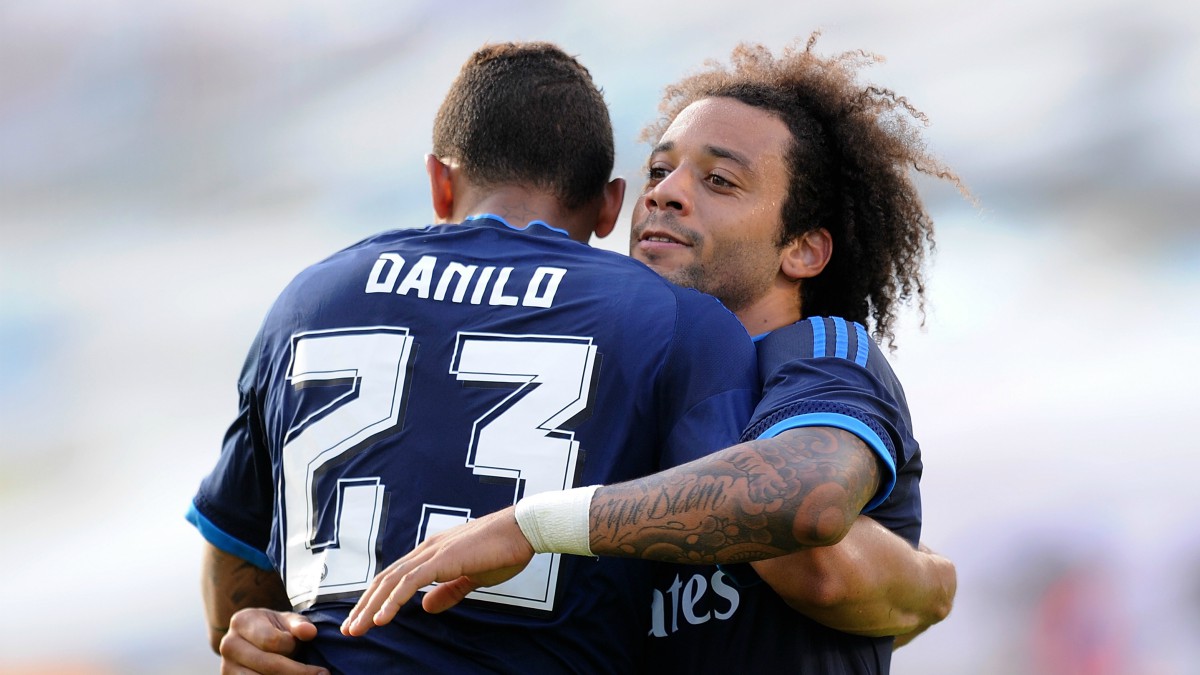 Marcelo y Danilo celebran un gol con el Real Madrid. (Getty)
