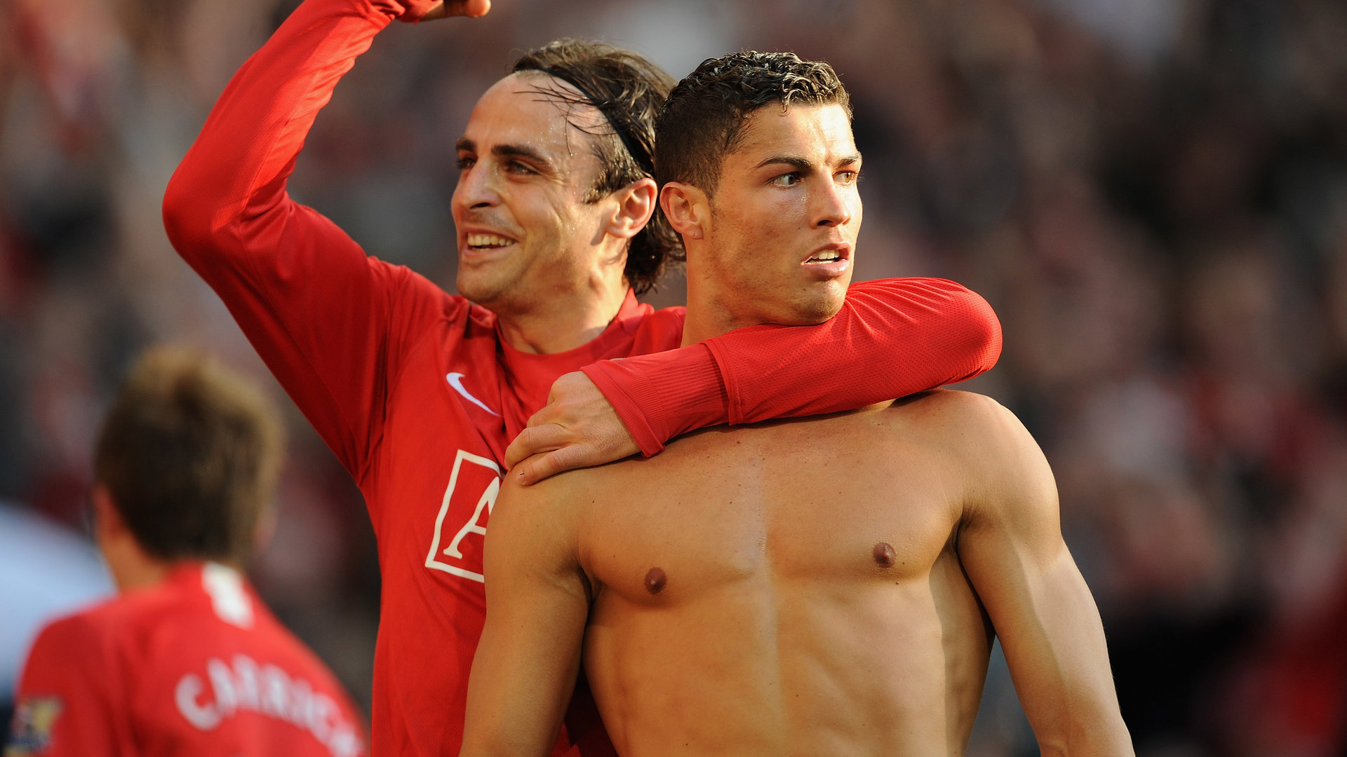 Cristiano Ronaldo y Berbatov celebran un gol con el Manchester United. (AFP)