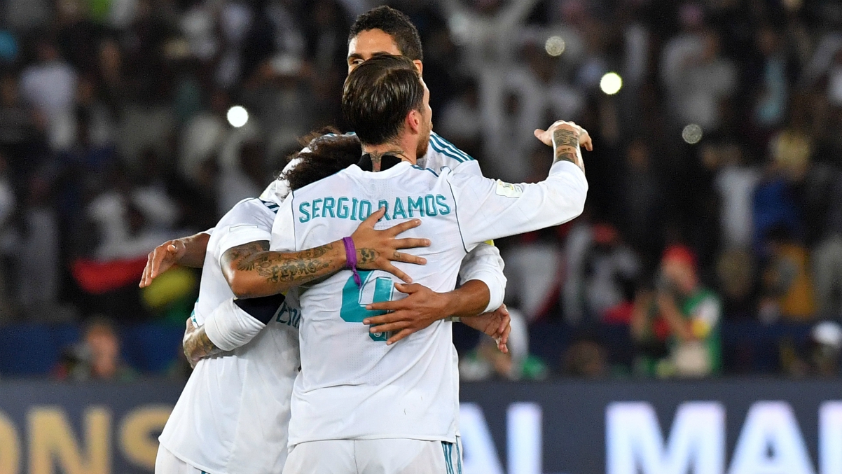 Sergio Ramos, Marcelo y Varane celebran el Mundial de Clubes tras el pitido final. (AFP)