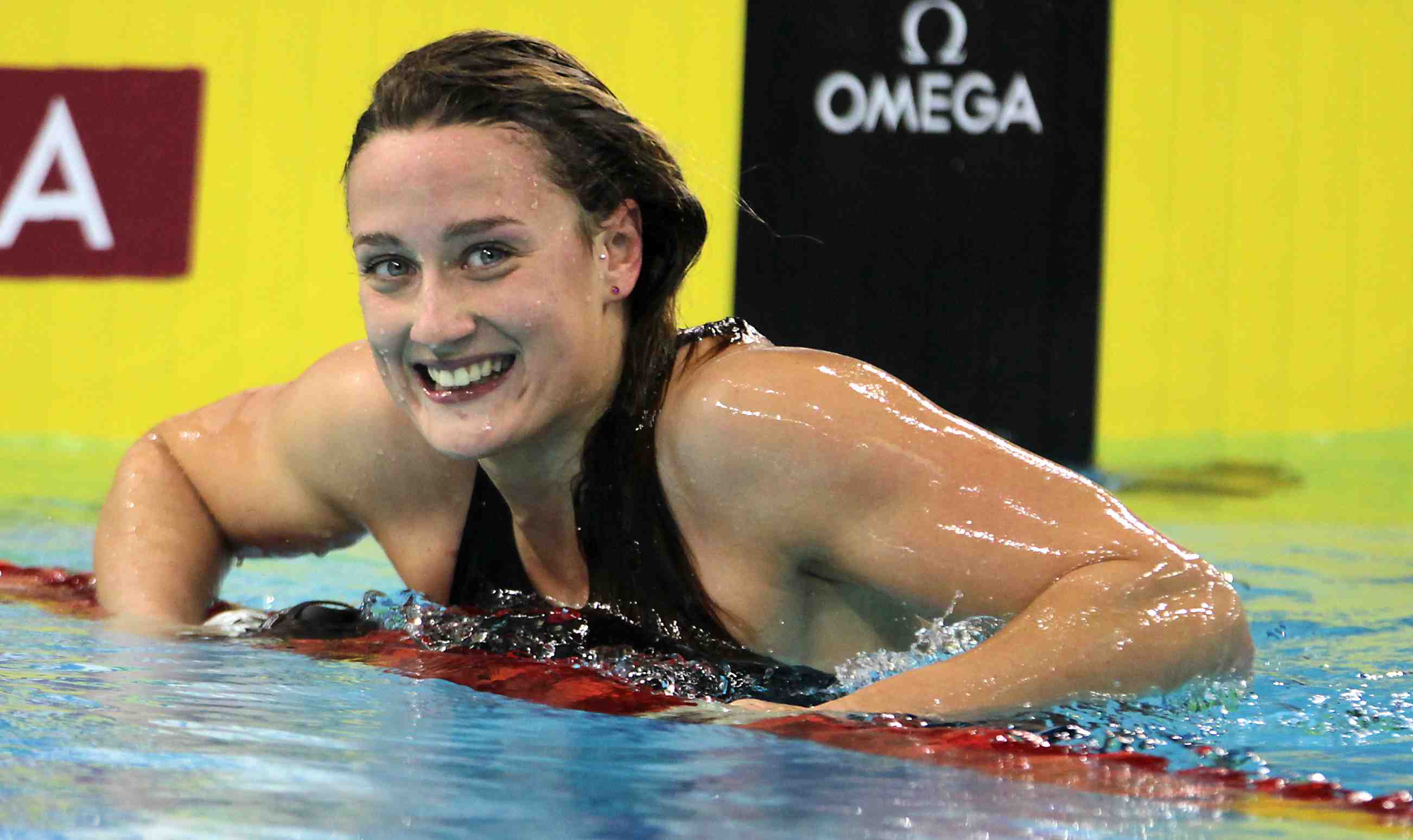 Spanish swimmer Mireia Belmonte reacts after winning the women’s 200m