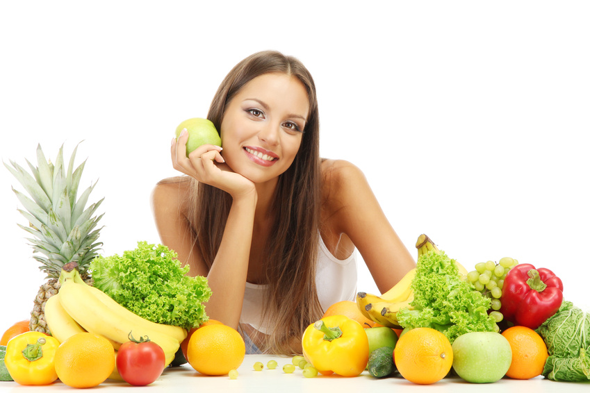 beautiful young woman with fruits and vegetables, isolated