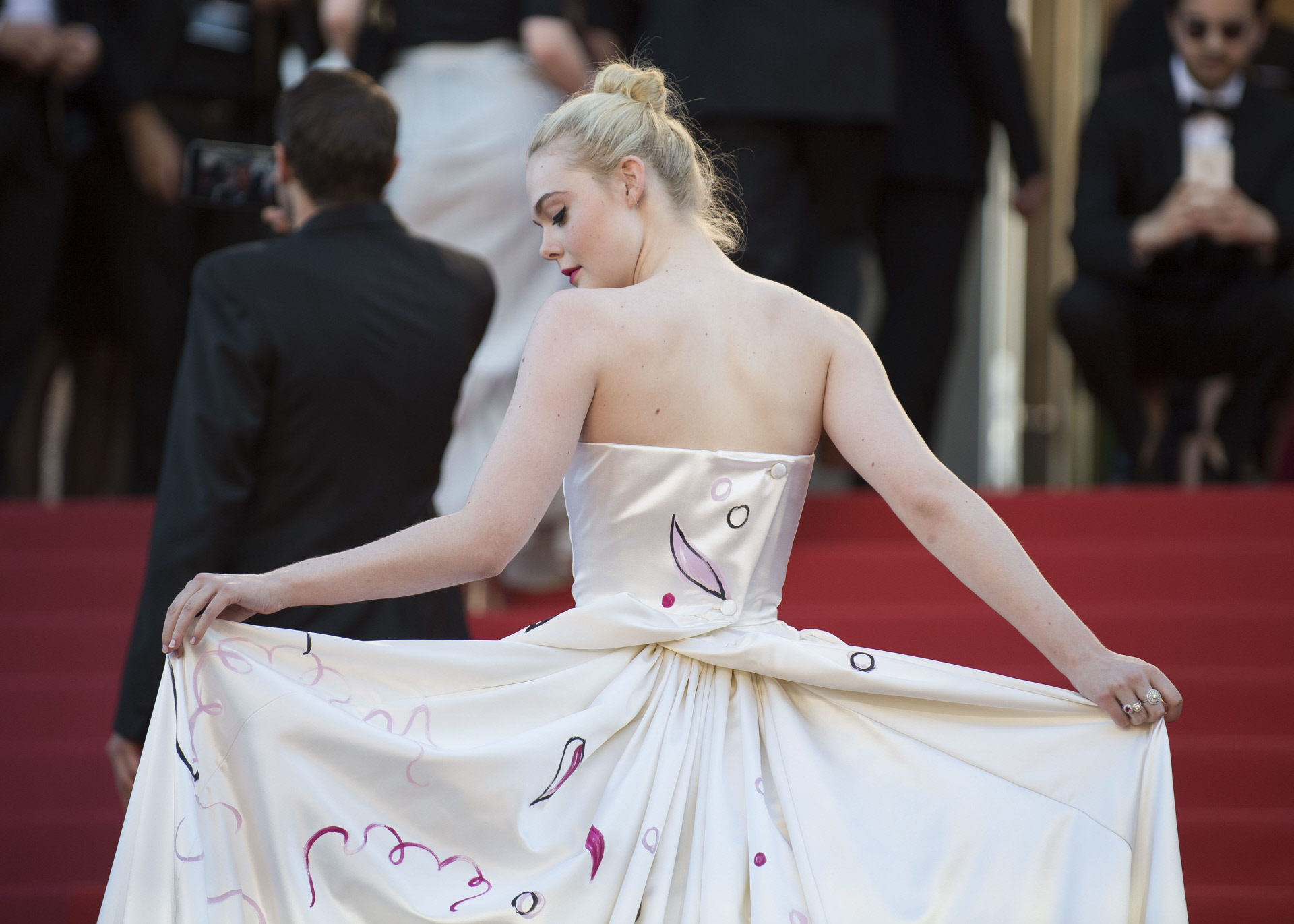 Actress Ella Fanning at the opening ceremony and the screening of the film Ismael's Ghosts at the 70th international film festival, Cannes, southern France, Wednesday, May 17, 2017