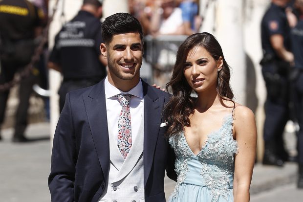 Marco Asensio y Sandra Garal en la boda de Ramos / Gtres