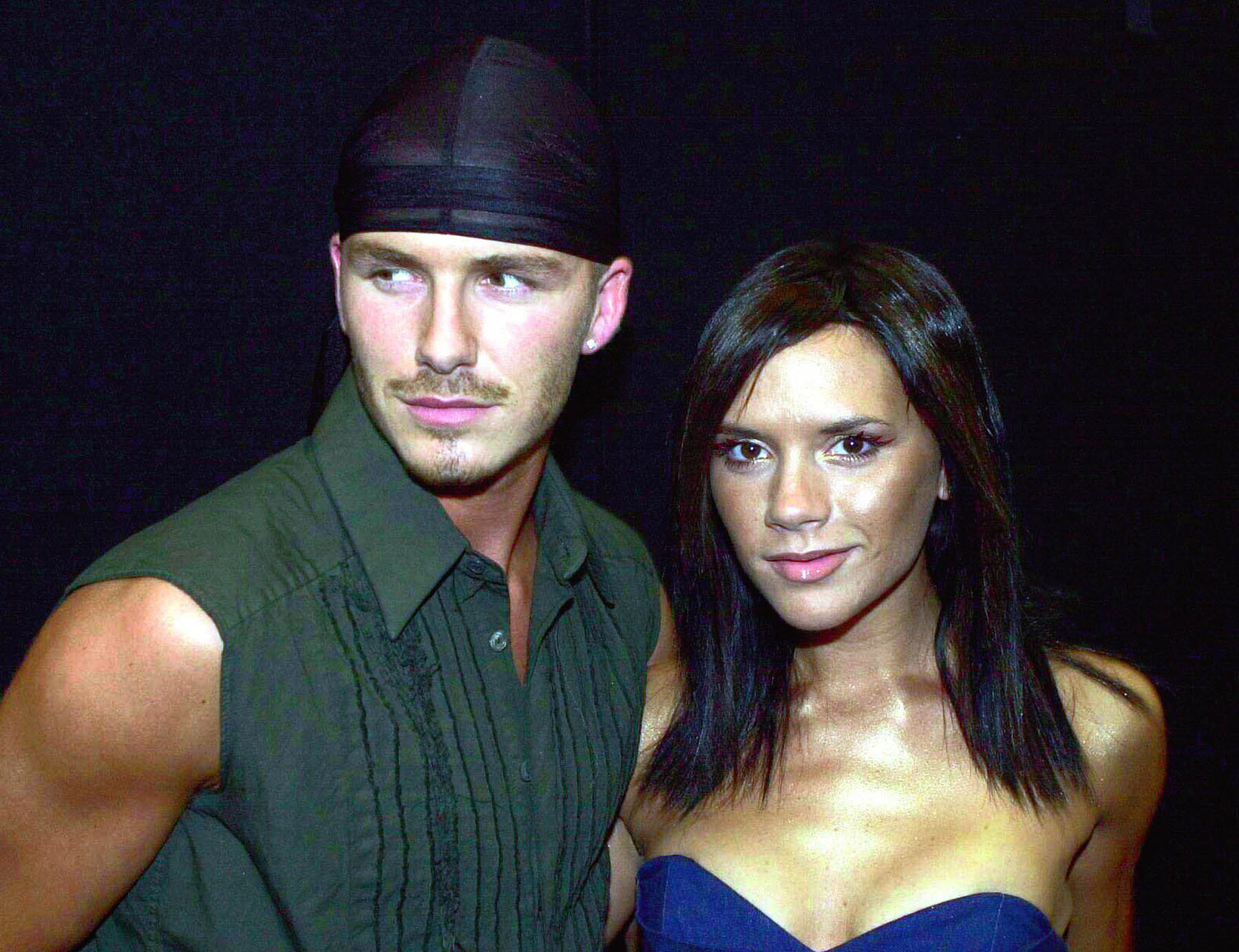 David y Victoria Beckham posando / Gtres