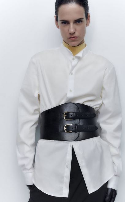 Zara's belt can be worn over a white shirt