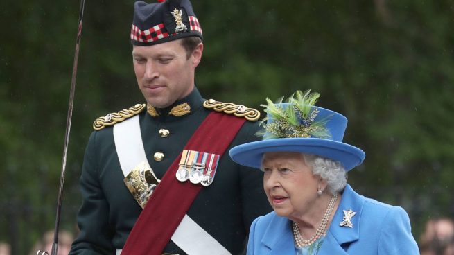 La reina Isabel II y Johnny Thompson