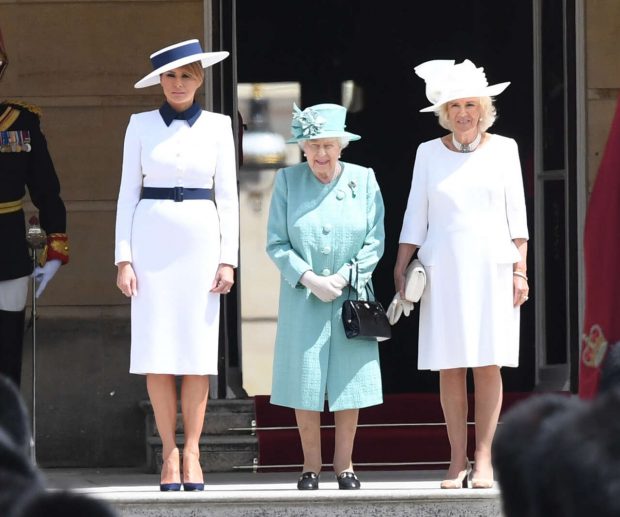 Melania con Isabel II y Camilla de Cornualles