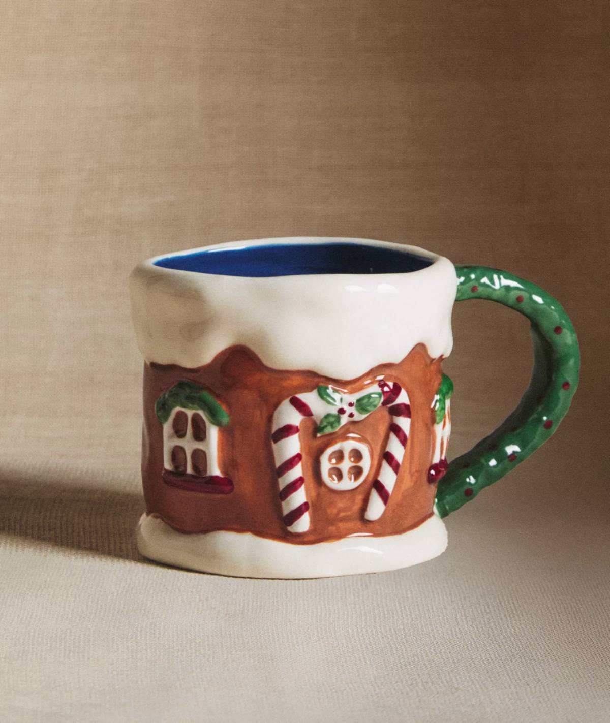 Taza infantil casa de jengibre de Zara Home.
