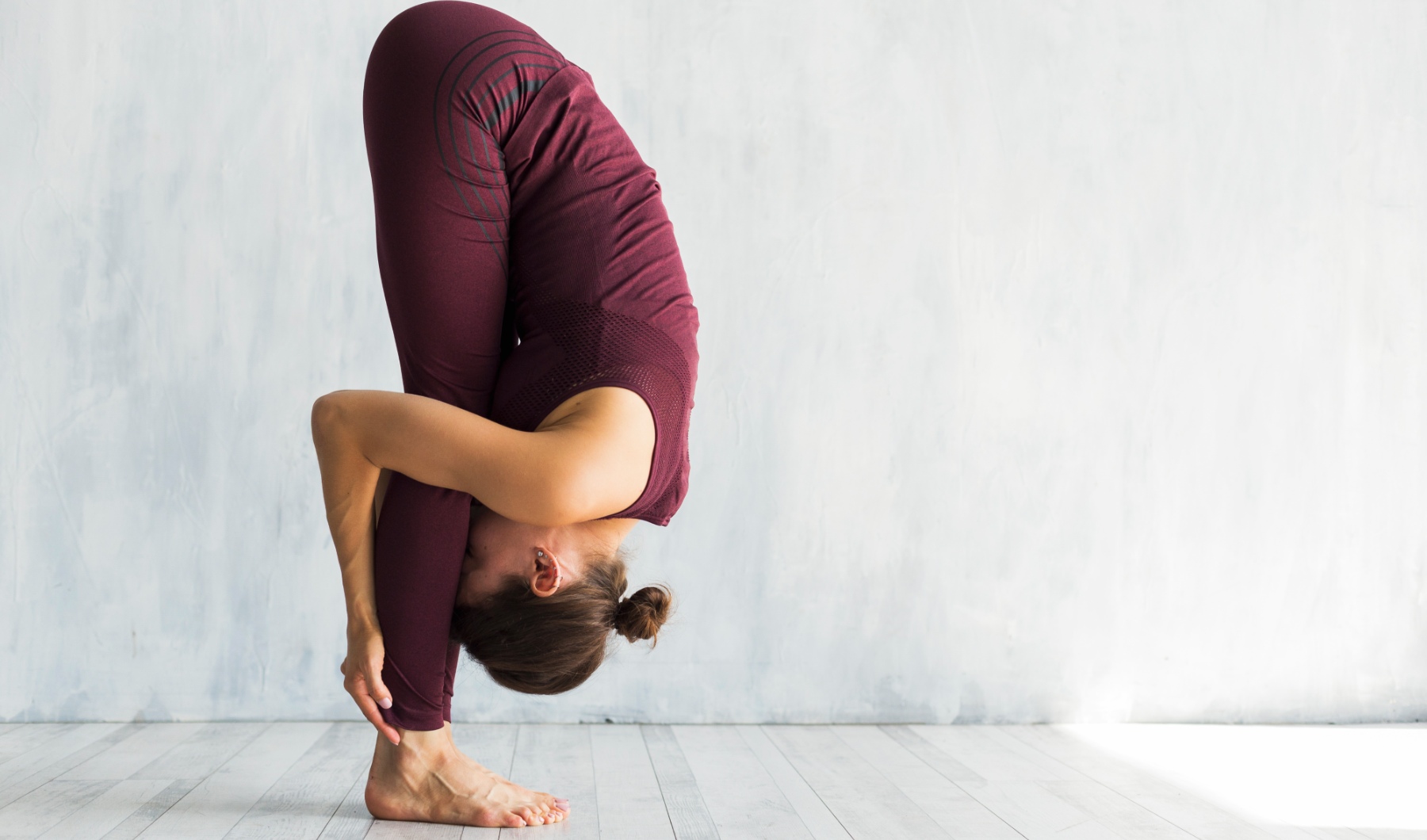 Standing Forward Bend Uttanasana. Image Freepik