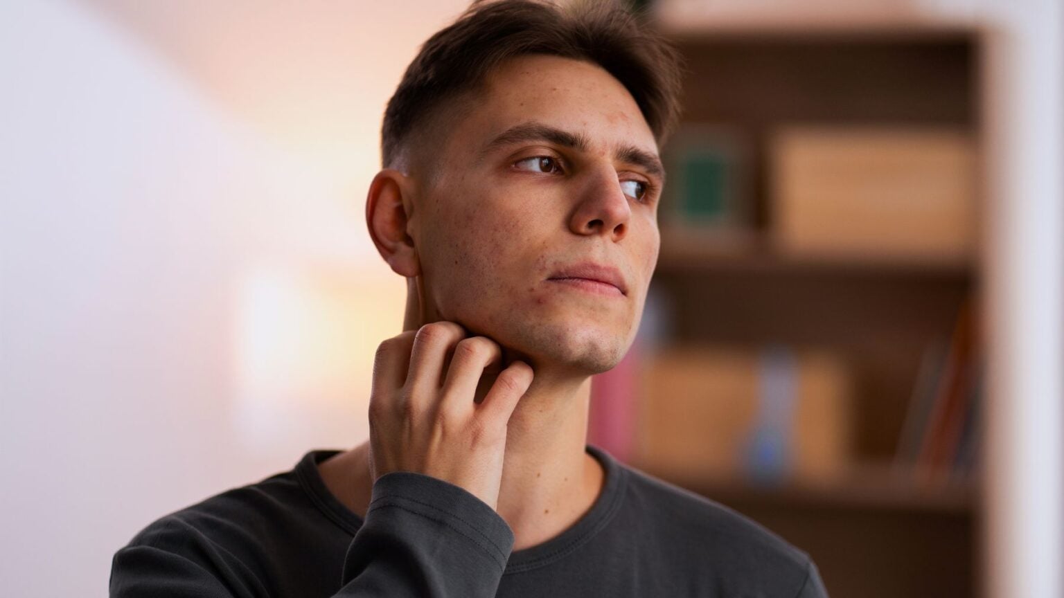 What does it mean to scratch your neck during a conversation, according