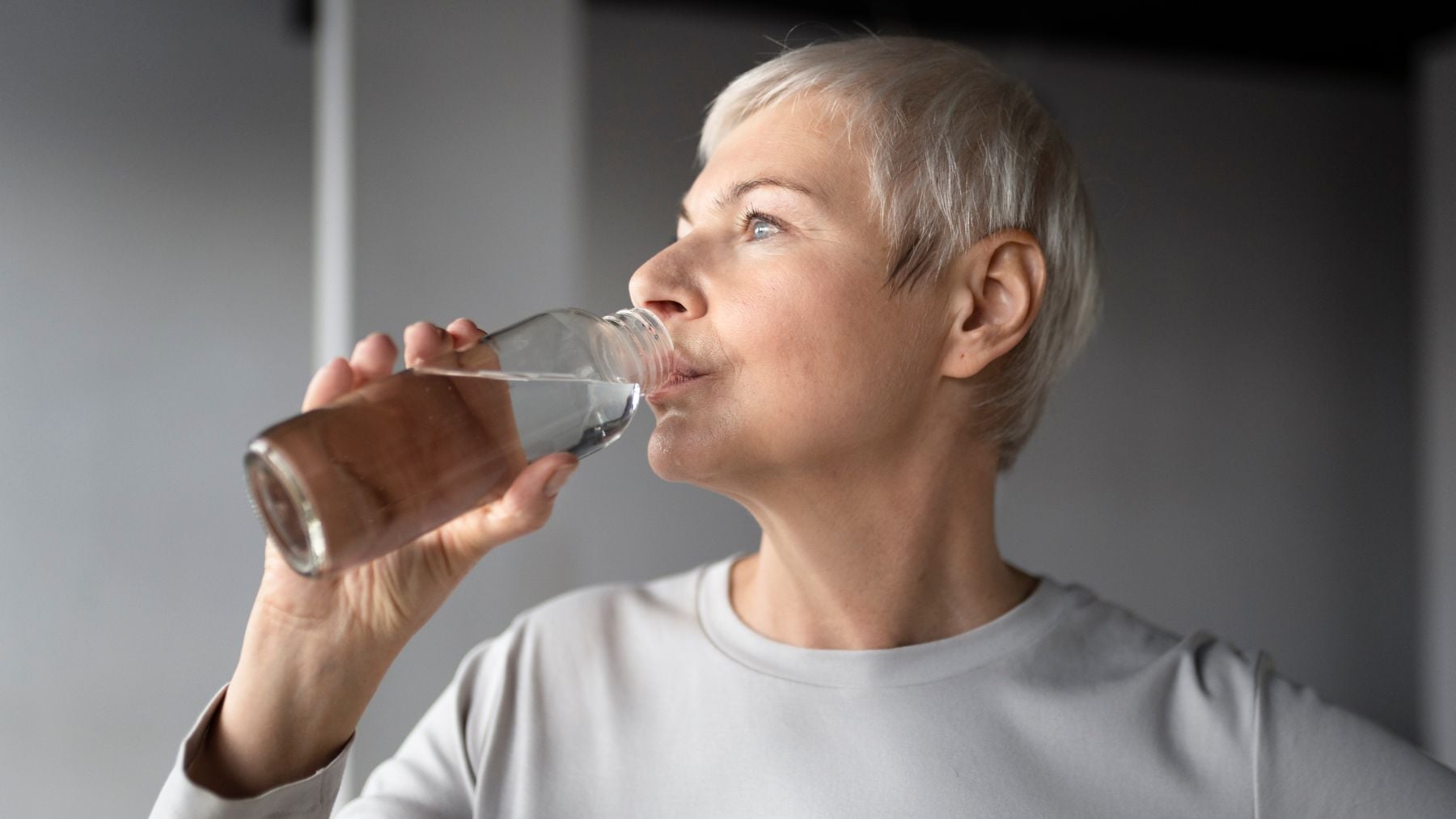 drinking water, senior woman