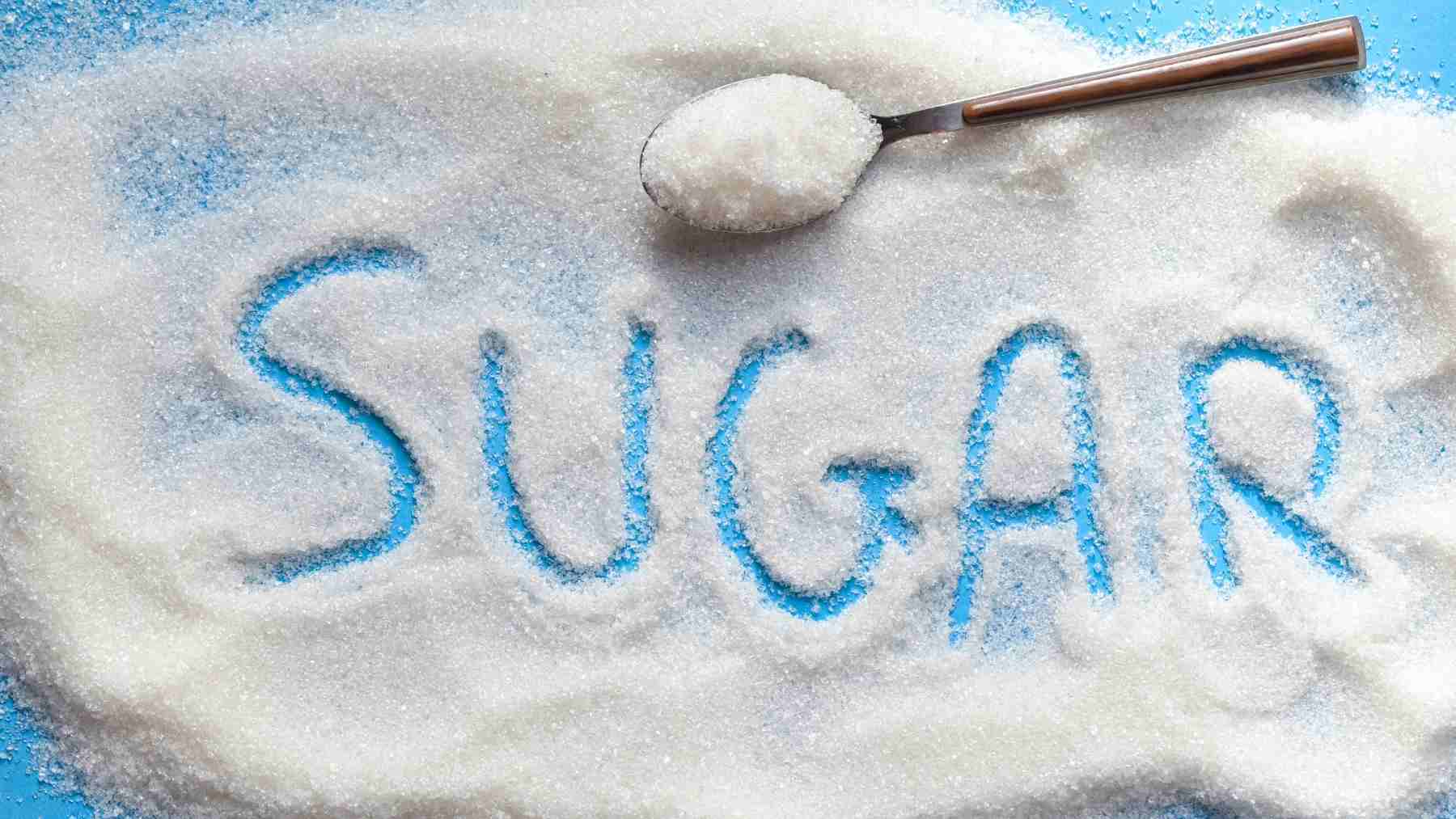Artificial sweetener crystals with the word “sugar” written in them, illustrating research on sugar-free products and brain health