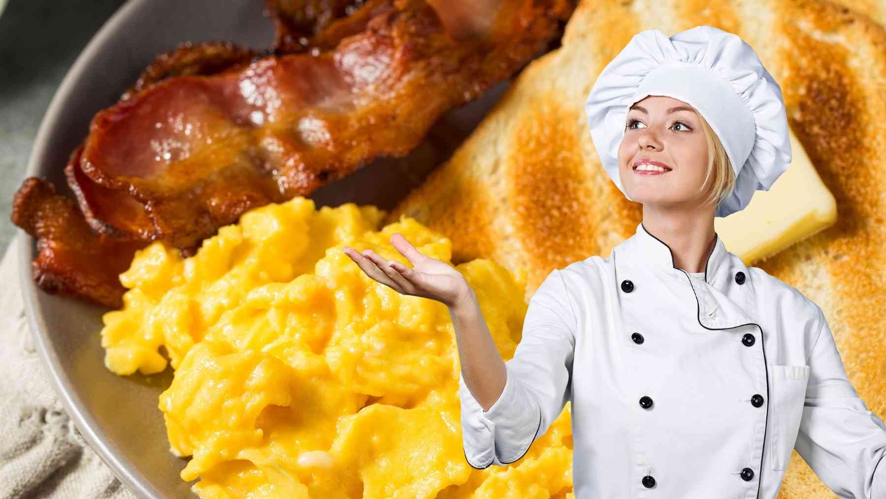 Chef presenting a classic American breakfast with scrambled eggs, bacon, and buttered toast.
