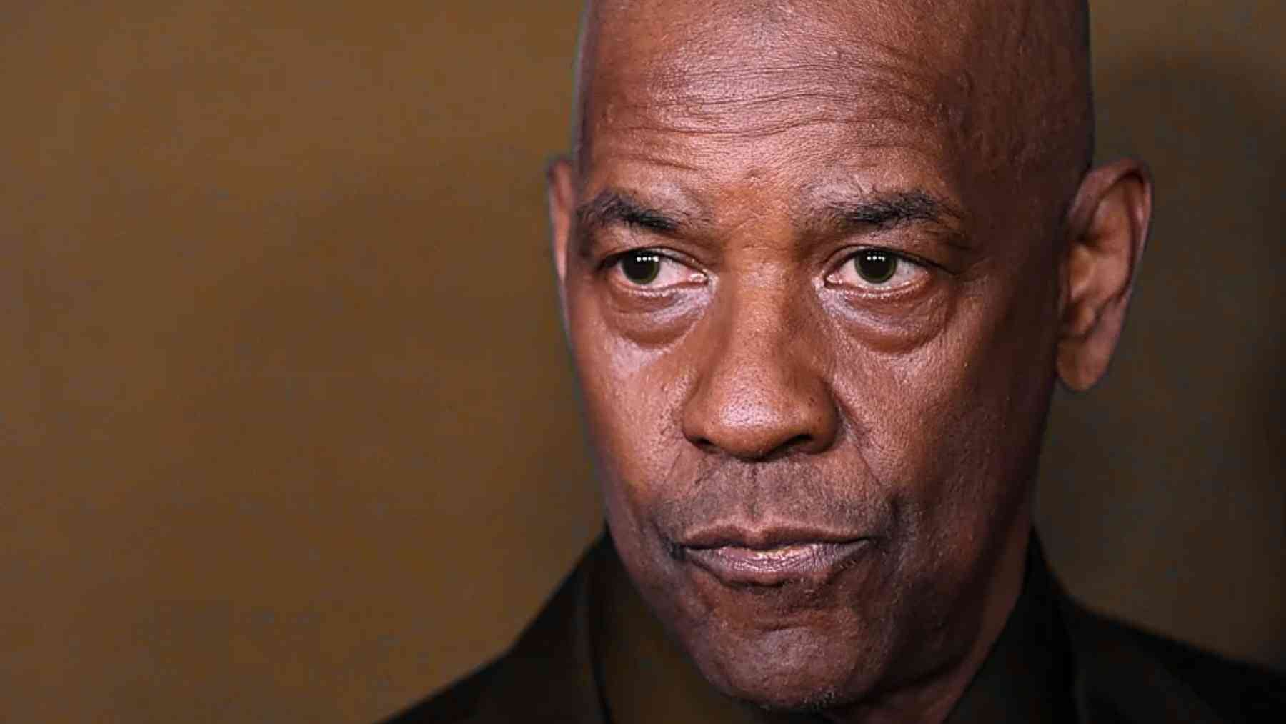 Close-up portrait of Denzel Washington for a story about resilience, growth, and his rain and mud quote.