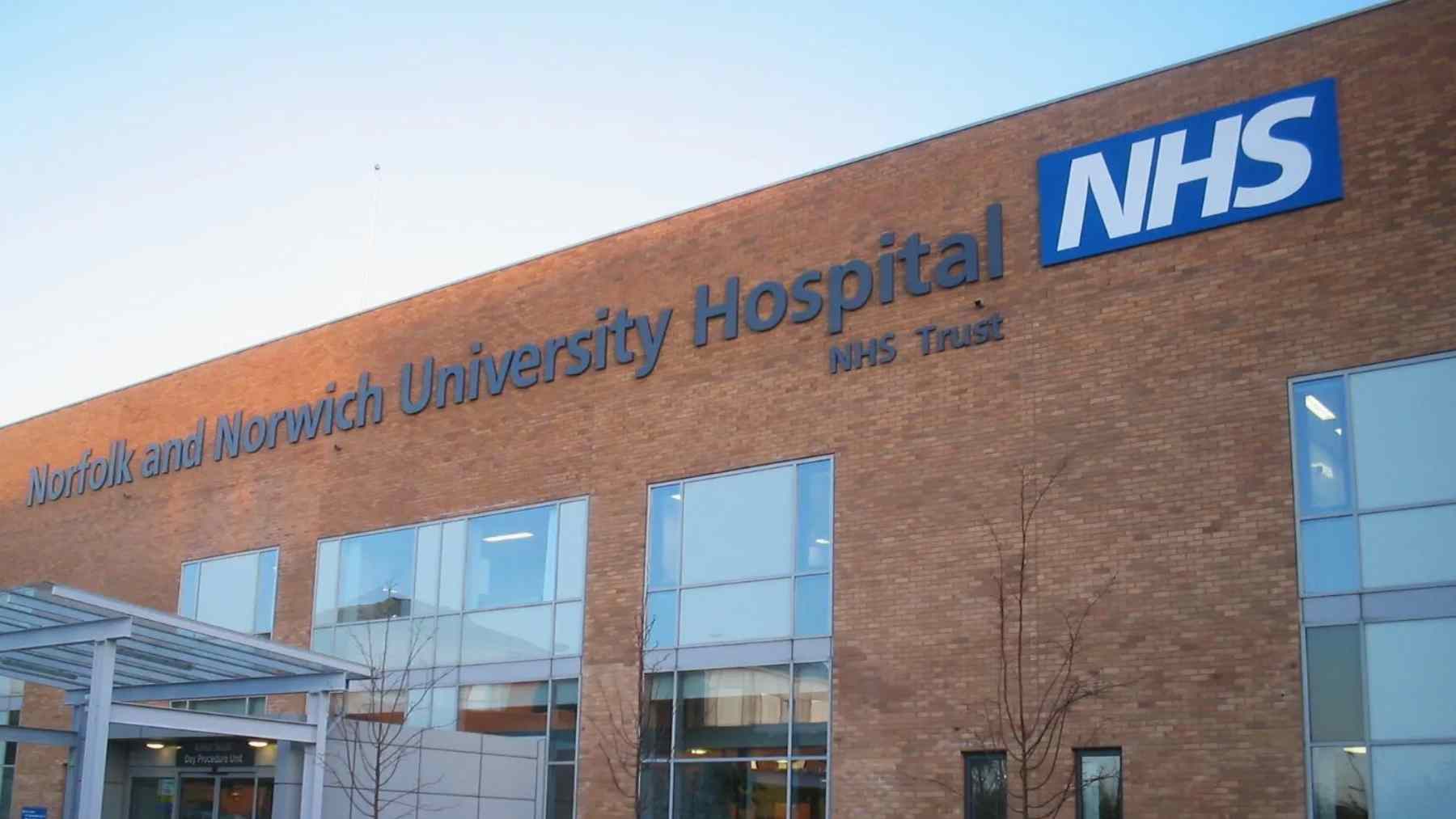 Norfolk and Norwich University Hospital NHS Trust building amid reports of NHS hearing aid 312 battery shortages.