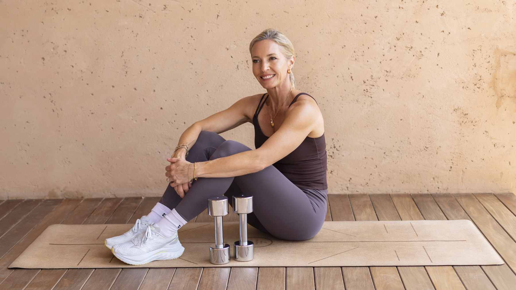 I tried a 10-minute mobility workout a trainer has done for over 20 years, and the twist is why it feels small in the moment but shows up everywhere in how your body moves 1 A person performing guided mobility exercises on a yoga mat to improve joint range of motion and reduce muscle stiffness.