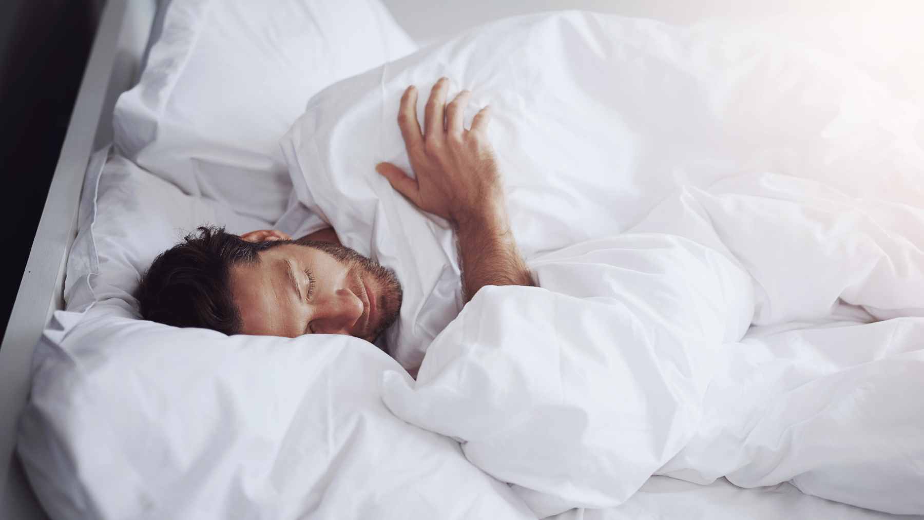 Neuroscience looks at the 12 most common dreams and what they may be quietly revealing about your emotions 1 An artistic illustration showing a person dreaming, with abstract symbols representing common dream themes like falling and flying.