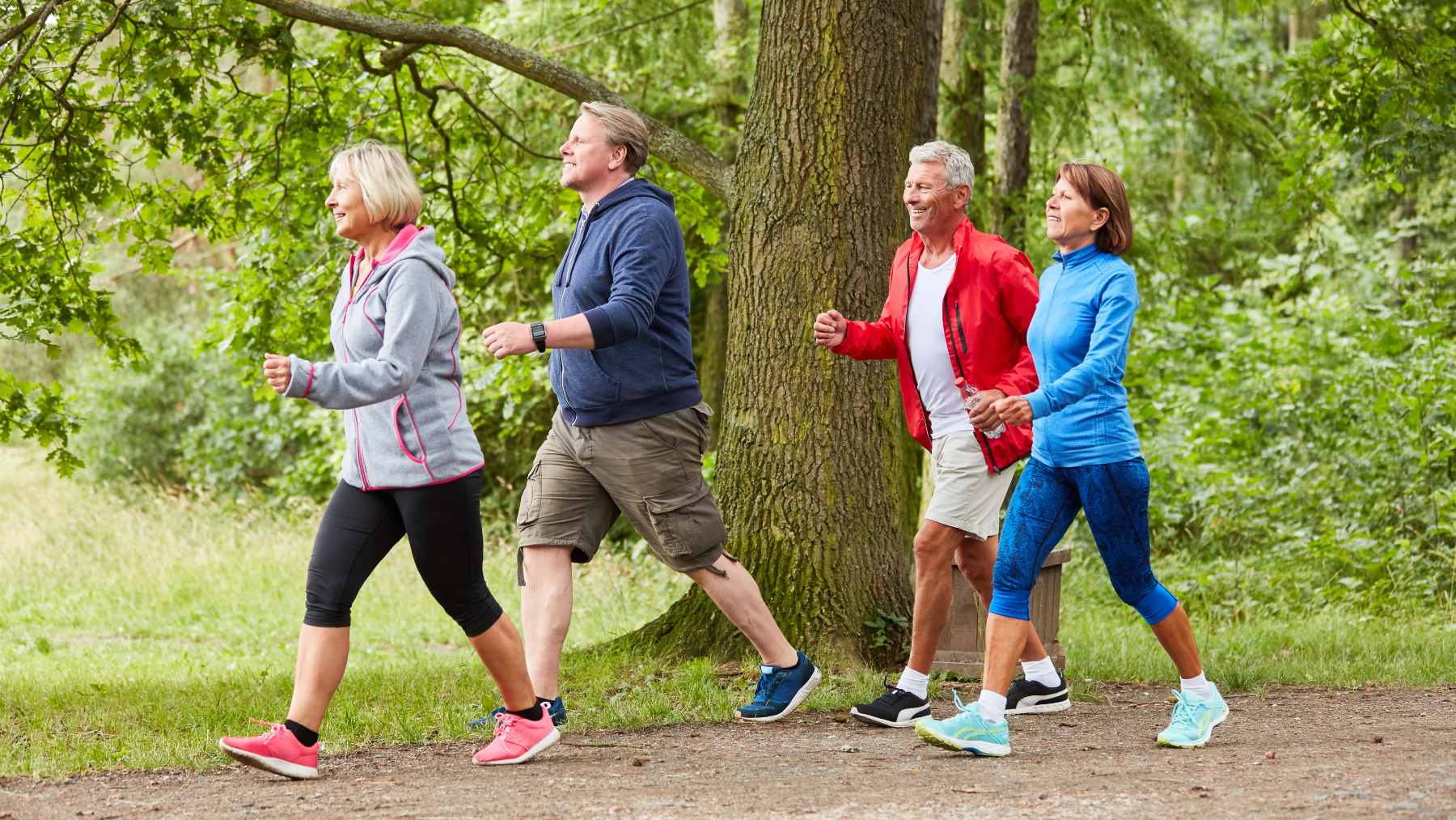A person walking in a park, representing the simplicity and effectiveness of daily exercise for physical and mental well-being.