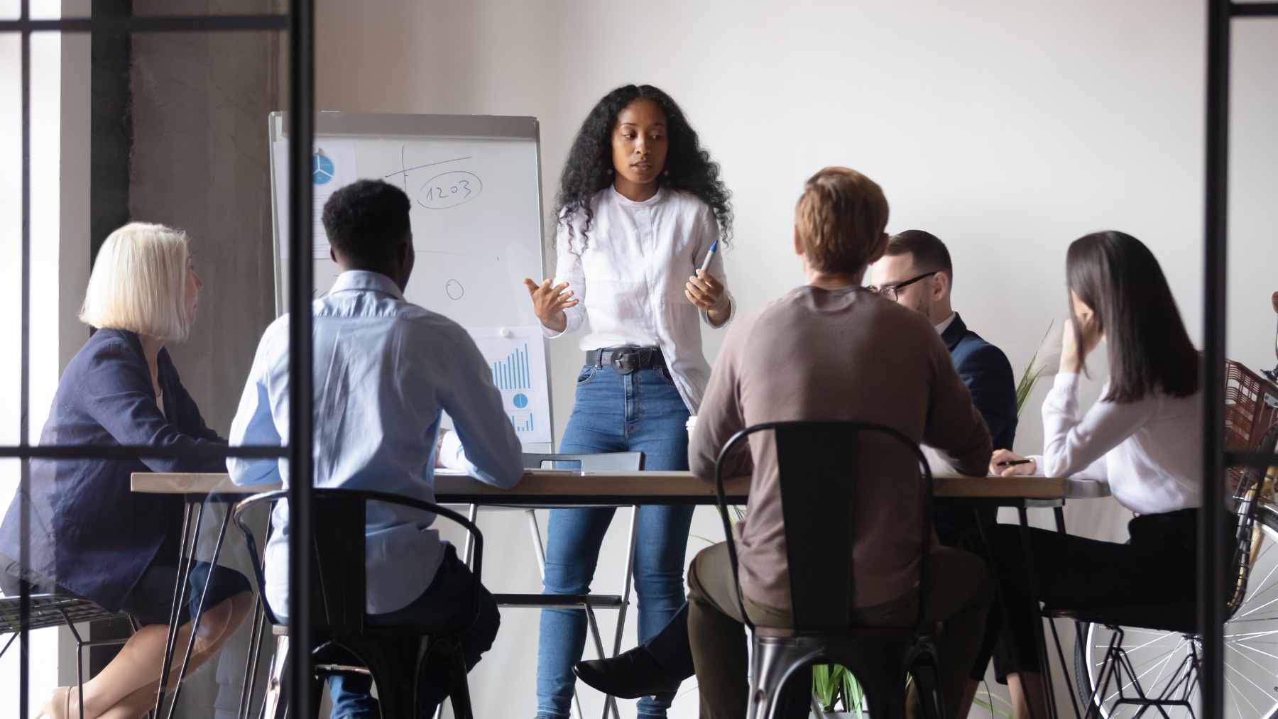 A study says people born between 1997 and 2012 developed one key psychological skill, and it may explain a lot about this generation 1 A young professional navigating multiple digital interfaces on a laptop, symbolizing the ability to adapt to fast-paced workplace technology.
