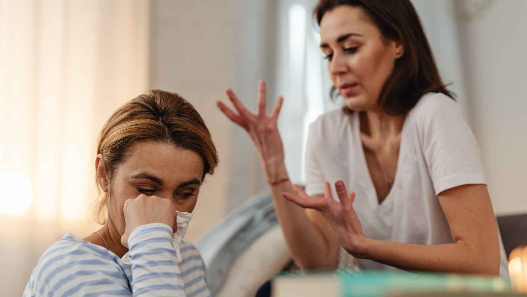 Person remaining calm and emotionally neutral during a tense conversation, illustrating the gray rock method used to manage manipulative behavior.