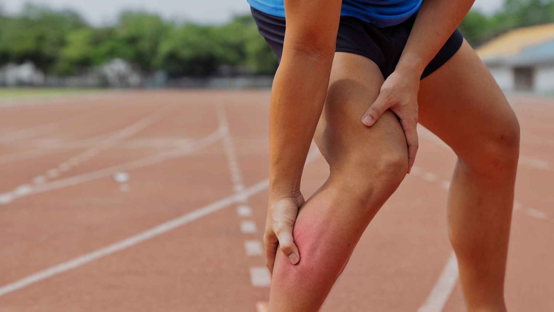 Woman performing a lower-body strength exercise to improve leg strength, balance, mobility, and overall fitness.