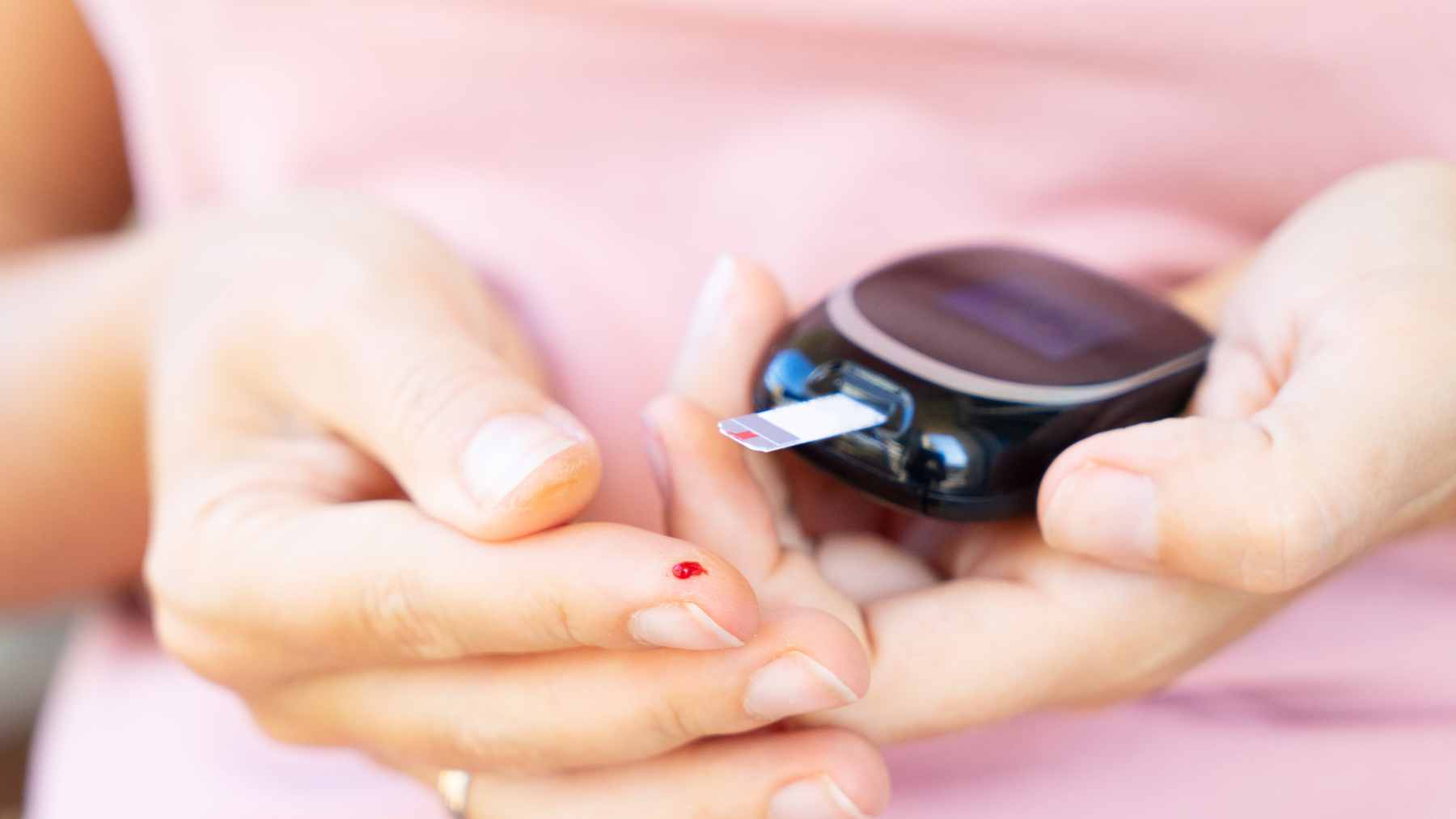 A medical professional discussing blood test results with a patient, highlighting the importance of screening for prediabetes.