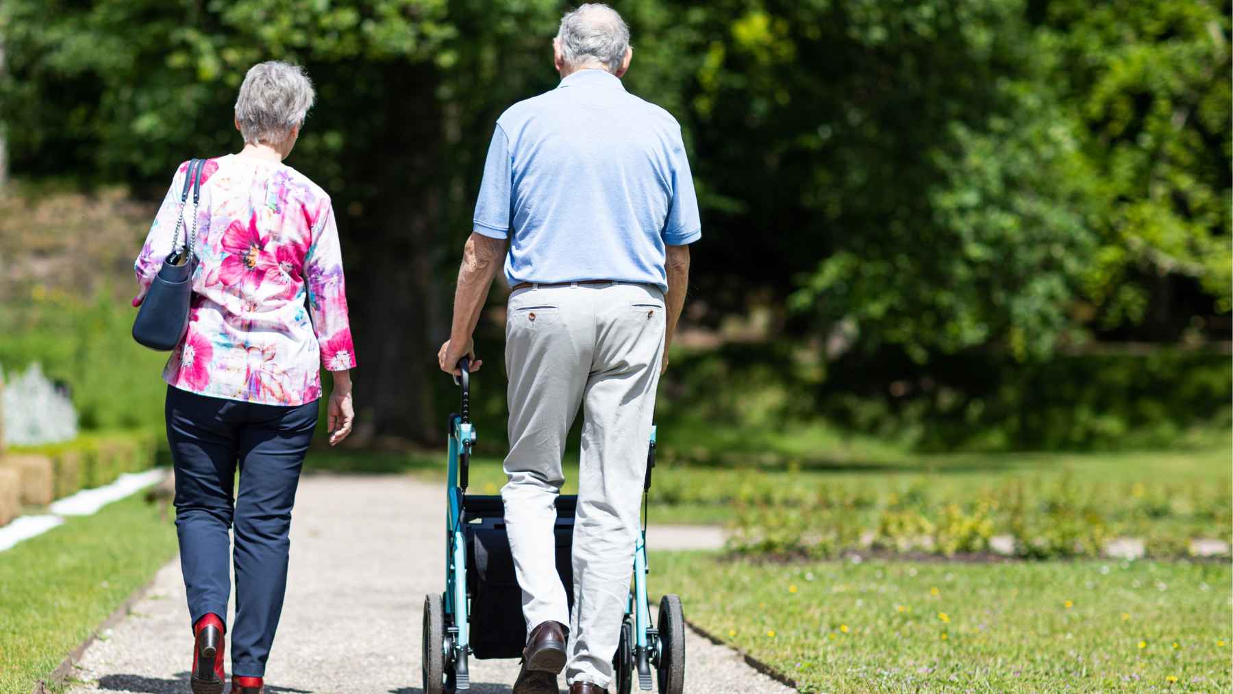 Older adult walking outdoors as part of a daily 30-minute exercise routine that supports heart health, mobility, and stress reduction after age 60.
