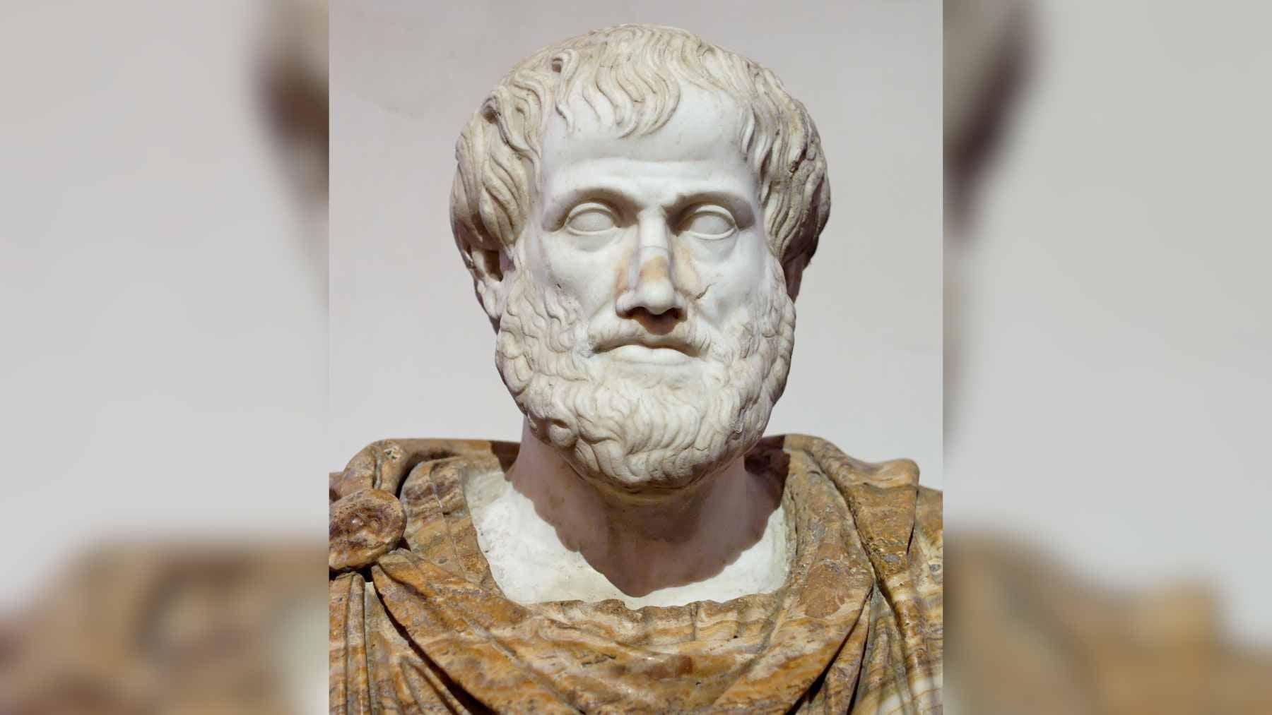 A bust of Aristotle paired with modern digital typography representing the challenge of maintaining truth in a post-truth media environment.