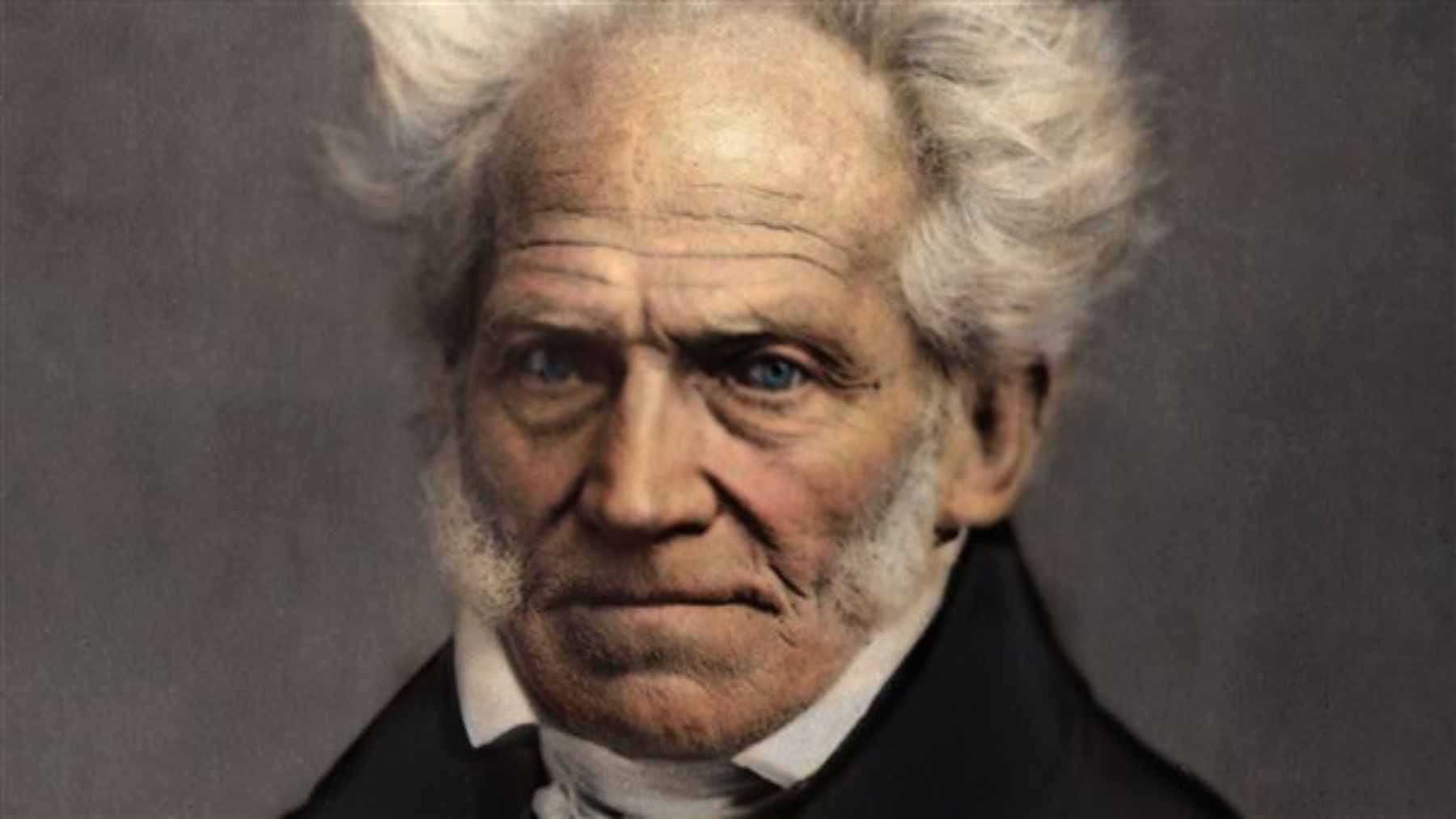 A portrait of Arthur Schopenhauer next to an open book, symbolizing the philosophical concept of life as a text and its later commentary.