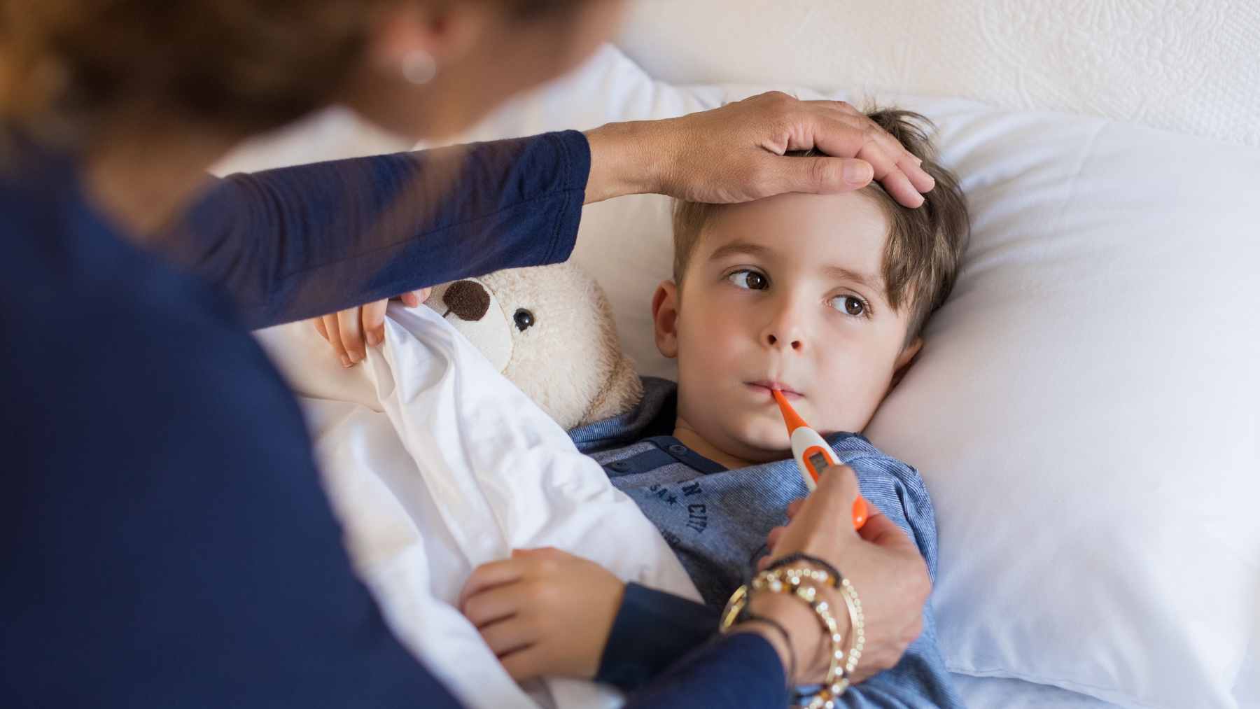 Autoimmune disease is climbing fast among children, and science says where your kids grow up may quietly tilt the odds 2 A young child visiting a pediatrician in a modern medical clinic, representing the pediatric research on childhood autoimmune conditions and regional diagnosis patterns.