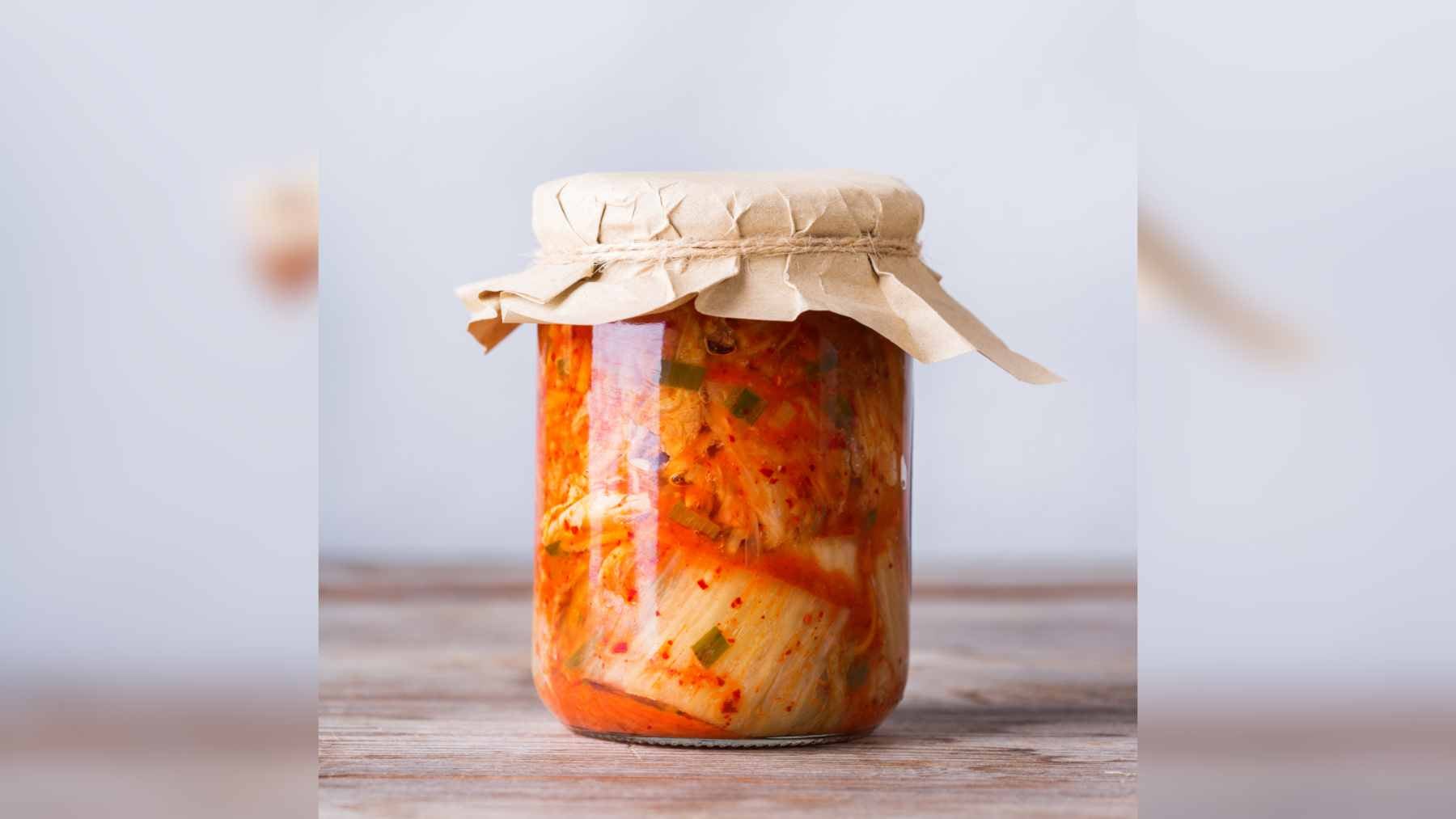 The one habit nearly every centenarian shares sits on your plate: a nutrition expert points to fermented foods as the quiet key 1 A bowl of fresh fermented yogurt topped with berries and seeds, symbolizing gut health and longevity.
