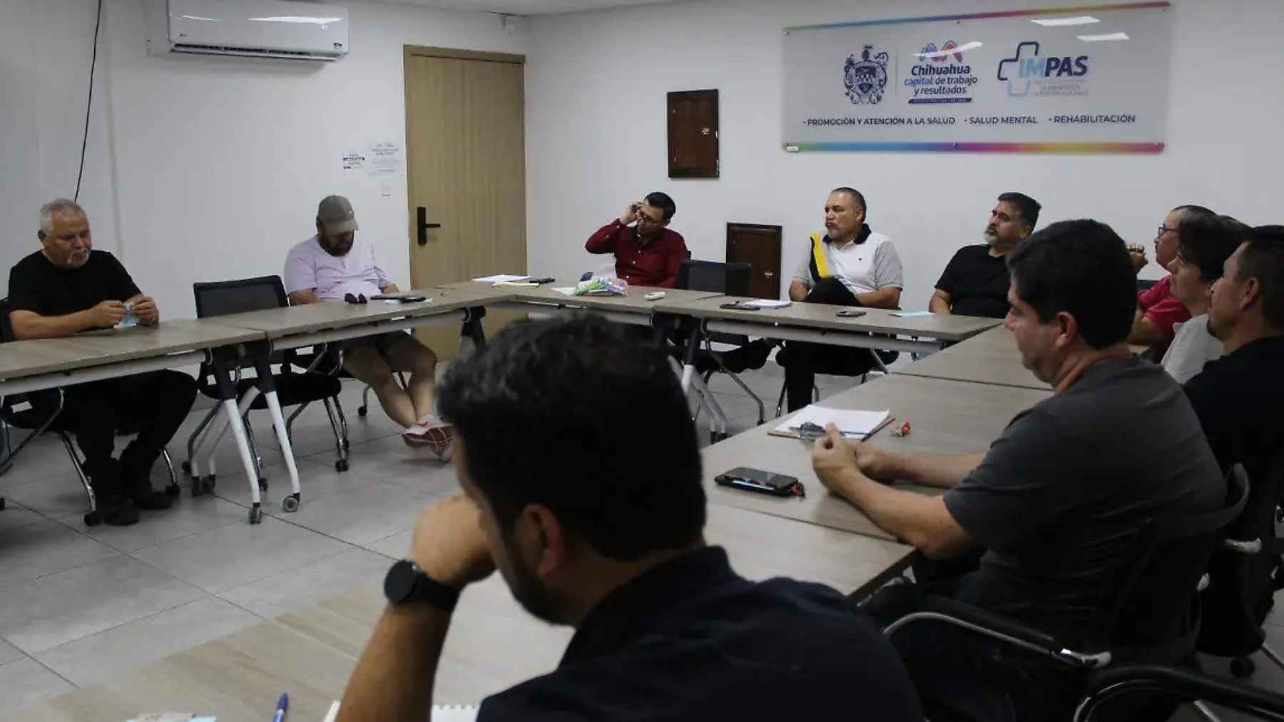 Psychology says men quietly carry a mental-health weight nobody talks about, and one city just built a room where they can put it down 1 Men attend a professionally guided mental health support group meeting organized by Chihuahua's Municipal Institute for Prevention and Health Care.