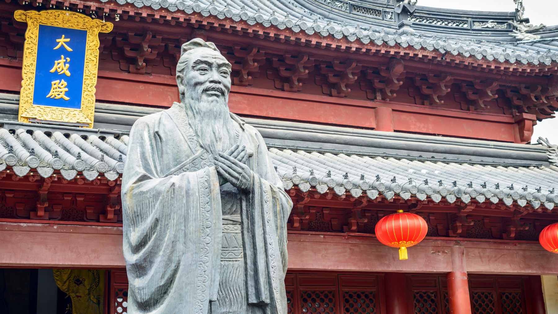 A classic artistic portrait of the philosopher Confucius, representing timeless wisdom regarding mortality and purpose.