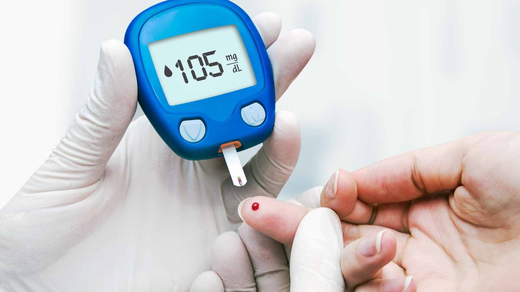 A person looking thoughtfully at a continuous glucose monitor on their phone, surrounded by symbols of emotional balance and physical health.