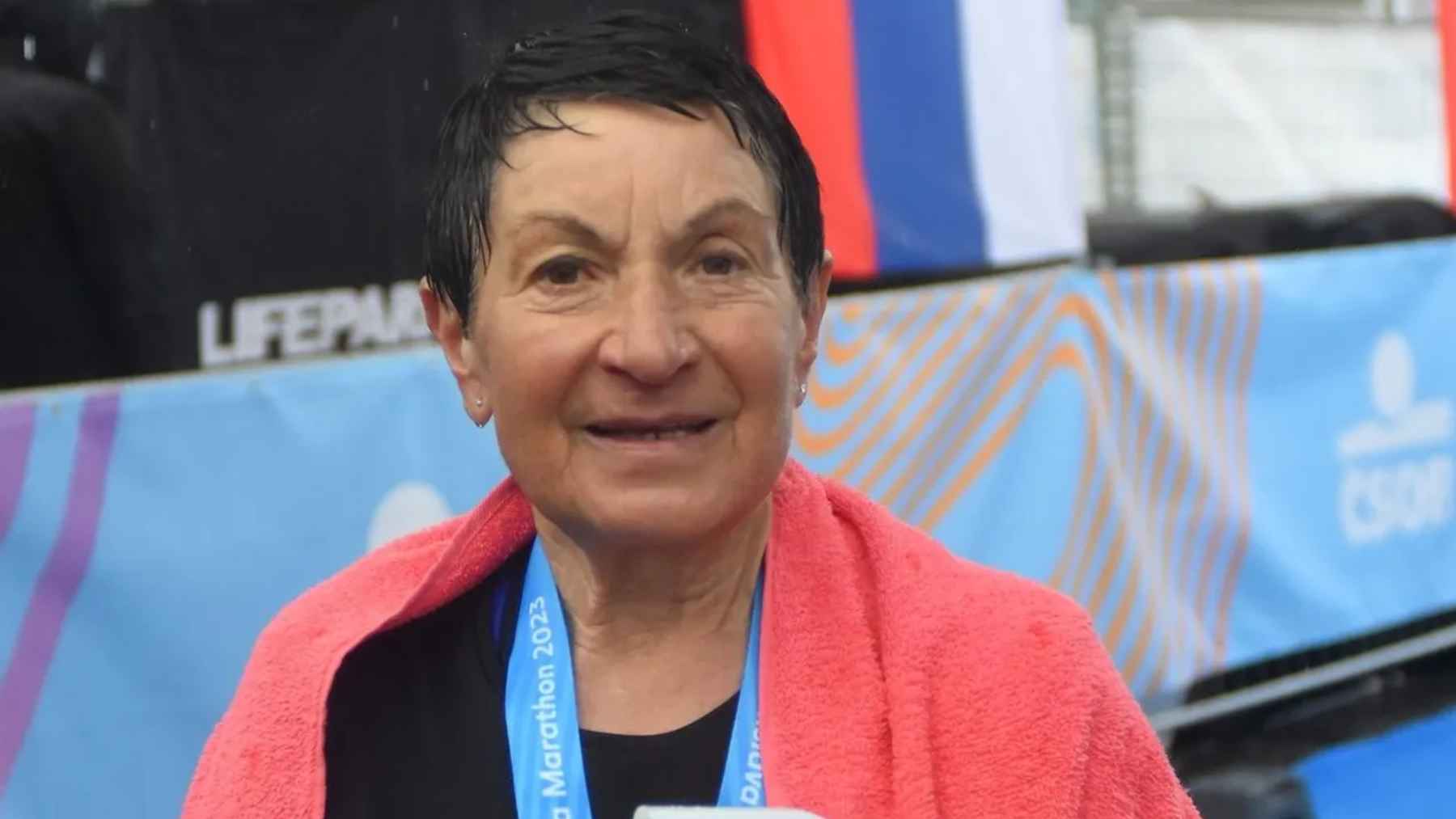 Eva Seidlová, 78, smiles outdoors after completing hundreds of marathons and competing at the Age Group World Championships.