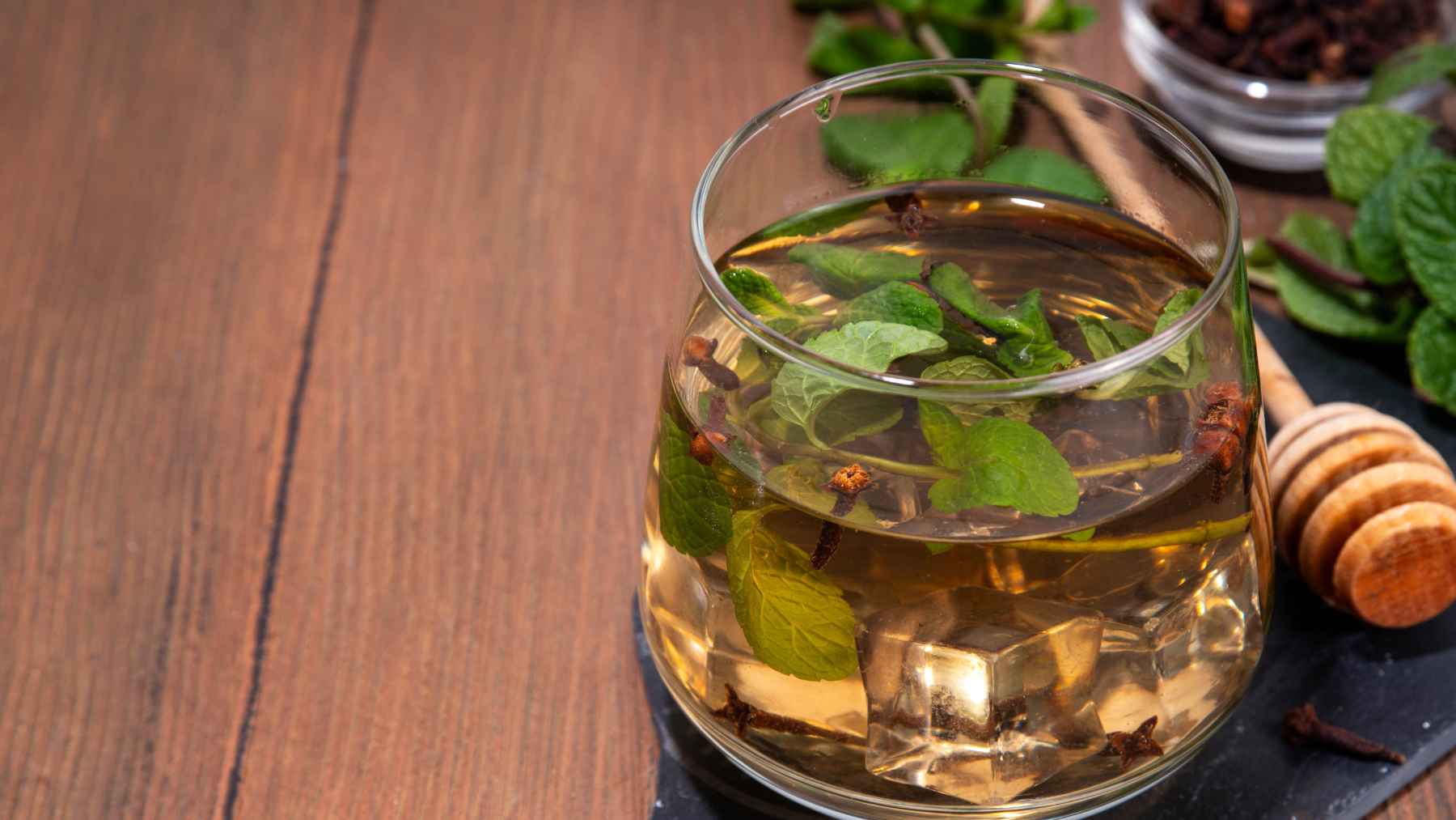 Fresh fig leaves prepared for an herbal tea infusion, a traditional home remedy now being studied for potential health benefits.