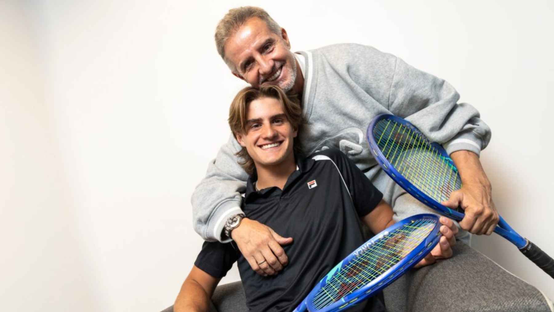 Horacio de la Peña poses with his son Bautista de la Peña, the young tennis player he is coaching as he begins his professional career.