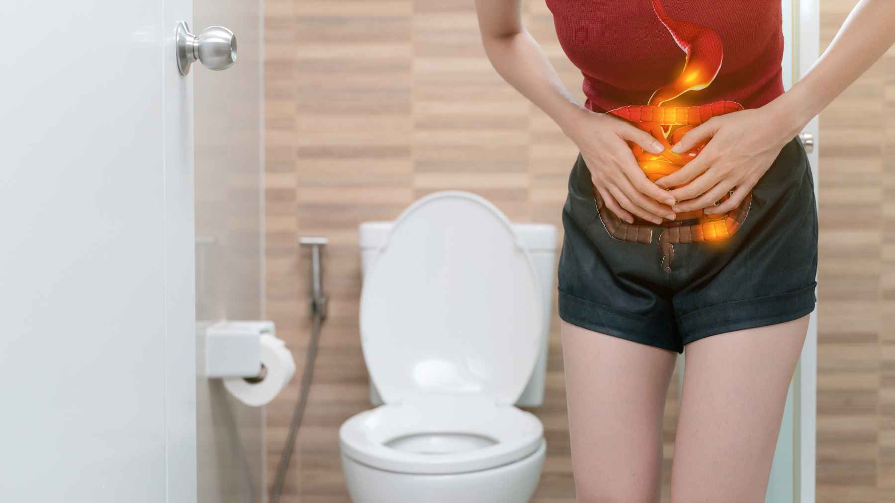Doctors say you can get your intestines moving again without straining, since four everyday habits do more than any laxative could 1 Person experiencing constipation in a bathroom, highlighting the importance of healthy daily habits that support natural bowel movements.