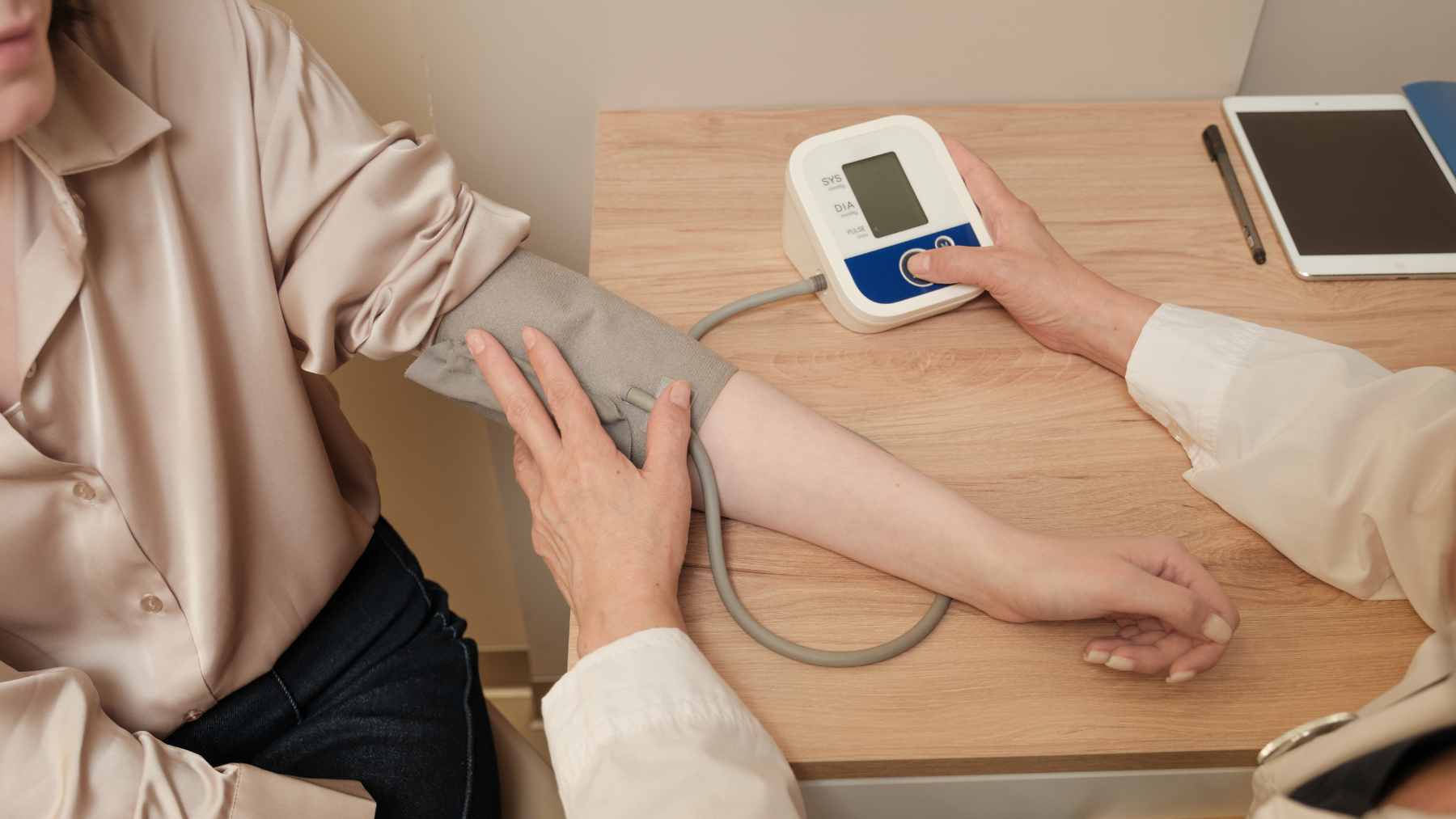 Nearly one in three adults has high blood pressure, but these seven daily habits can lower yours naturally, though one matters most 1 A close-up of a digital blood pressure monitor displaying a healthy reading, accompanied by heart-healthy foods like avocados and leafy greens.